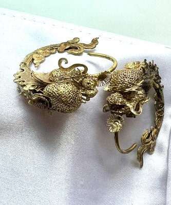 Ming Dragon Fish Earrings view one